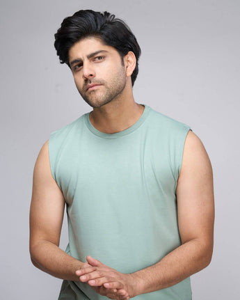 Mint green bamboo tank top for men, sleeveless and lightweight, offering breathable comfort for everyday wear.